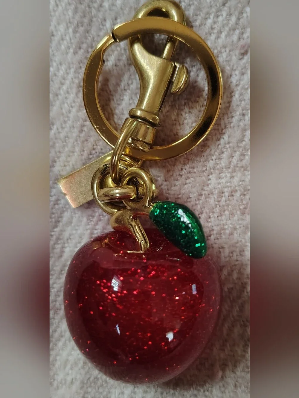 Source Unknown Gold-Tone Red Glitter Apple Keychain with Green Leaf Charm